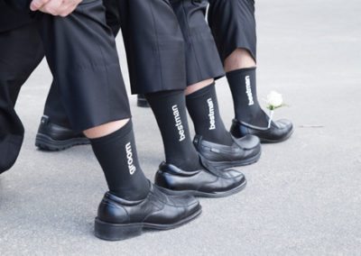 groomsmen showing matching socks at Wallaceville House