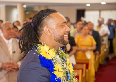 Closeup of smiling Tokelauan bridegroom in church