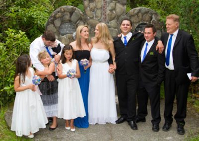 happy family group at outdoor nature wedding