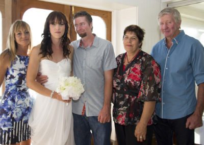 bride & groom with groom's parent