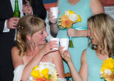 paper cup cheers with happy wedding party