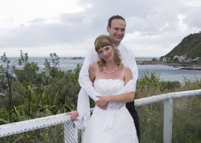 bride & groom outdoors seaside closeup