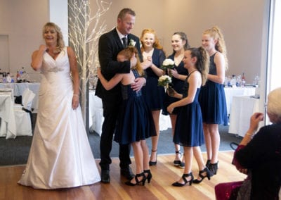 Dowse Art Gallery children hugging groom